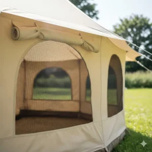 Half-moon mesh windows and air vents on a 4m bell tent providing airflow during British summer months.