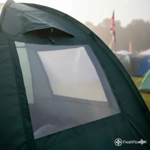Close-up of mesh ventilation panels on a tent designed to reduce condensation during humid nights at a festival.