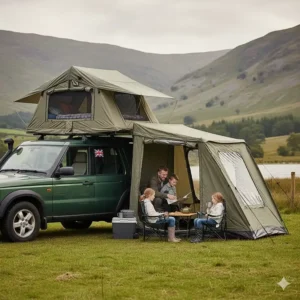 Alt text for image 2 A large soft-shell roof top tent with an annex providing extra living space for a family camping trip in the Lake District.