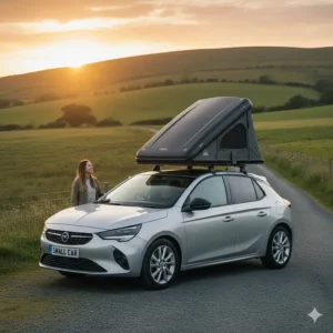 Alt text for image 3 A lightweight, compact roof top tent installed on a silver hatchback, demonstrating compatibility with smaller UK cars.