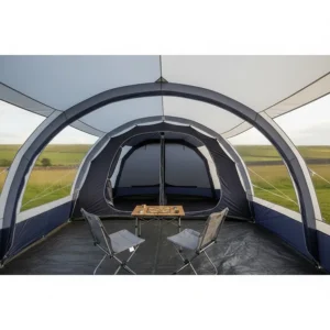 Internal view of a spacious 6-berth inflatable tent showing separate darkened bedrooms and a large living area.