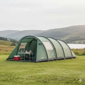 A tunnel tent with a large front porch extension providing a sheltered outdoor cooking area.