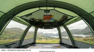 A photorealistic interior view of a tent featuring an integrated Vango gear loft, displaying neatly stored camping equipment and a Lake District map, emphasising convenience for British campers.