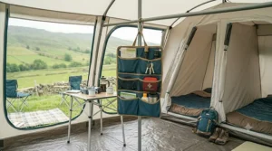 A tidy campsite setup showing the organiser keeping essential gear elevated and off the ground.