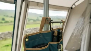 Detail shot of the velcro strap attaching the organiser to a tent pole for secure storage.
