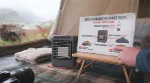 A safety diagram indicating the recommended clearance distances around the tent heater to keep sleeping bags and gear at a safe distance.