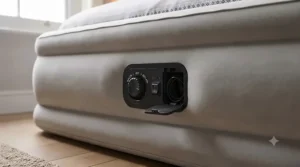 Compact deflated queen size air bed folded inside its waterproof travel storage bag next to a wardrobe.
