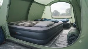 A double air bed fitted neatly inside the bedroom compartment of a standard four-person tunnel tent.